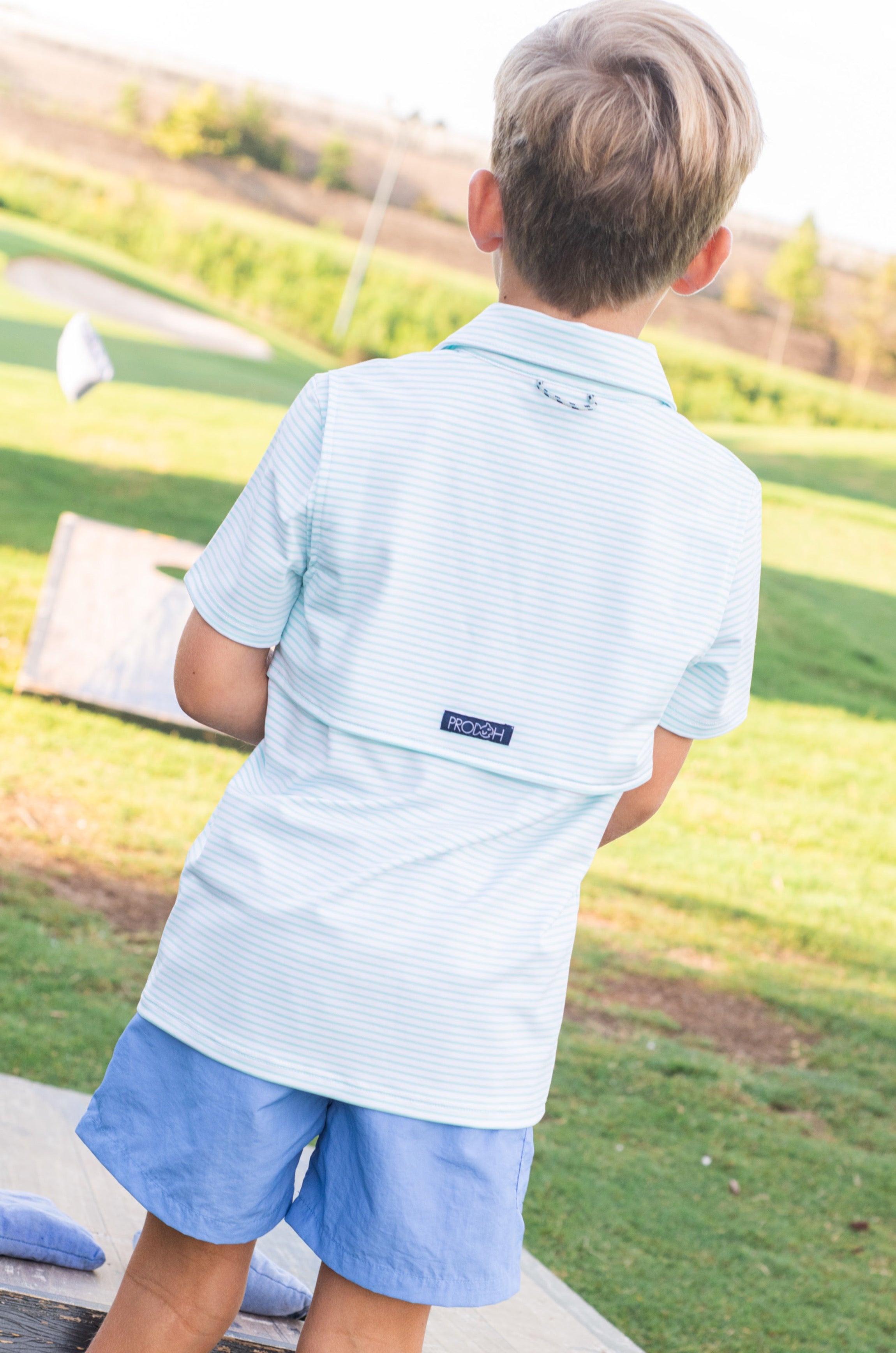 Polo garçon à manches courtes Pro Performance – Rayures bleu Aruba